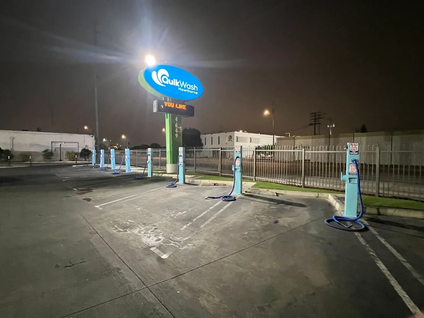 Job site signage, wide shot at night