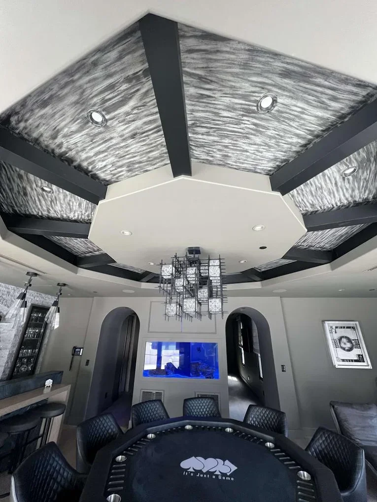 Octagonal tray ceiling with a specialty faux wood-grain finish